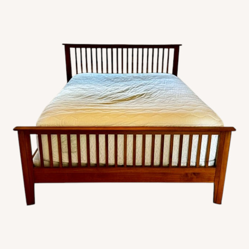 Used Light Brown Wood Queen Bed for sale on AptDeco