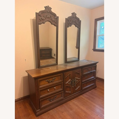 Used Vintage Dark Brown Wood Dresser With Mirrors for sale on AptDeco