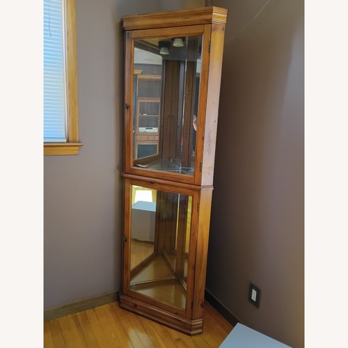 Used Ashley Furniture Natural Wood Cabinet for sale on AptDeco