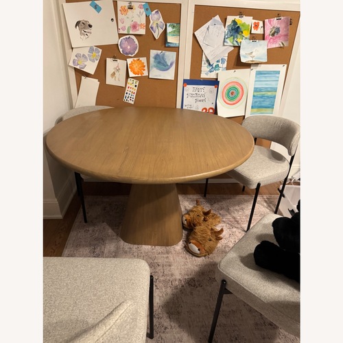 Used Article Kurasi 48" Solid Wood Round Dining Table - Natural for sale on AptDeco