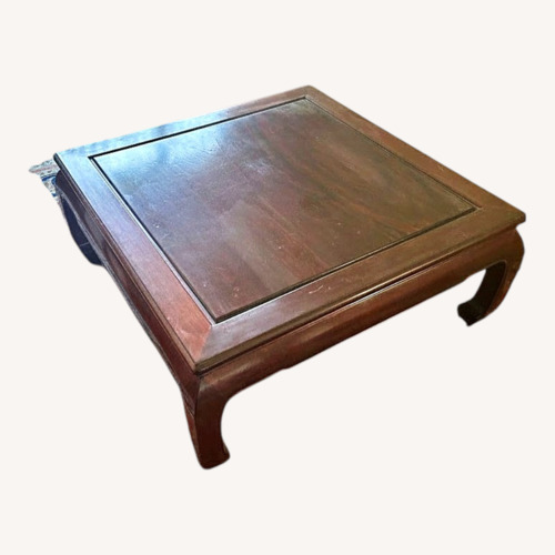 Used Dark Brown Wood Coffee Table for sale on AptDeco
