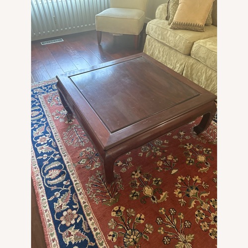 Used Dark Brown Wood Coffee Table for sale on AptDeco