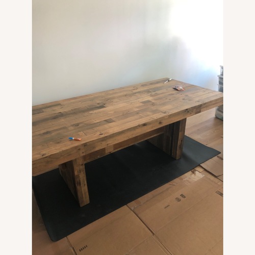 Used Natural Wood Dining Table for sale on AptDeco