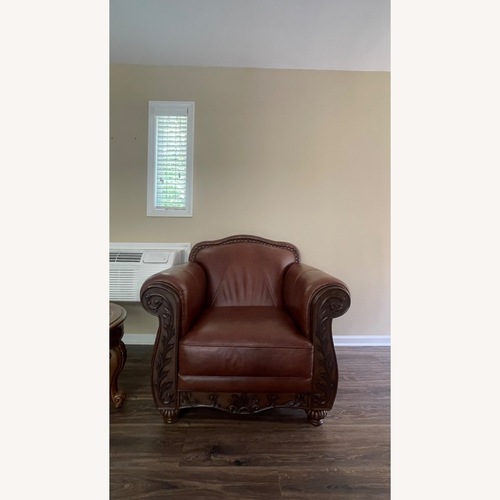 Used Vintage/Antique Dark Brown Leather Loveseat for sale on AptDeco