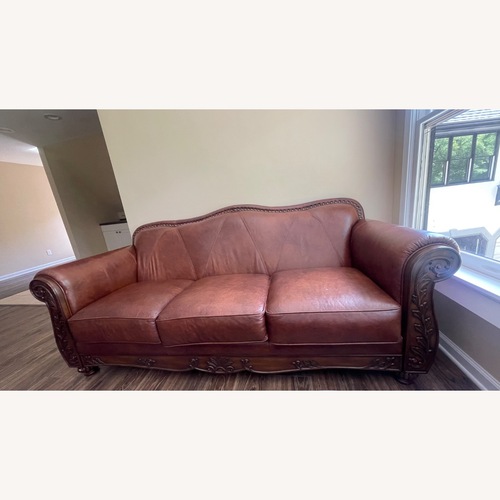 Used Vintage/Antique Dark Brown 3+ Seater Sofa for sale on AptDeco