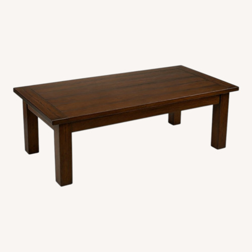 Used Pottery Barn Dark Brown Wood Coffee Table for sale on AptDeco