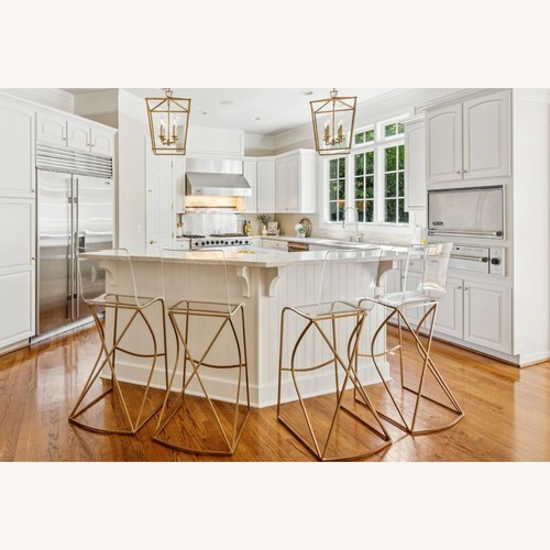 Used Amazon 30" Bar Height Stools in Acrylic & Gold for sale on AptDeco