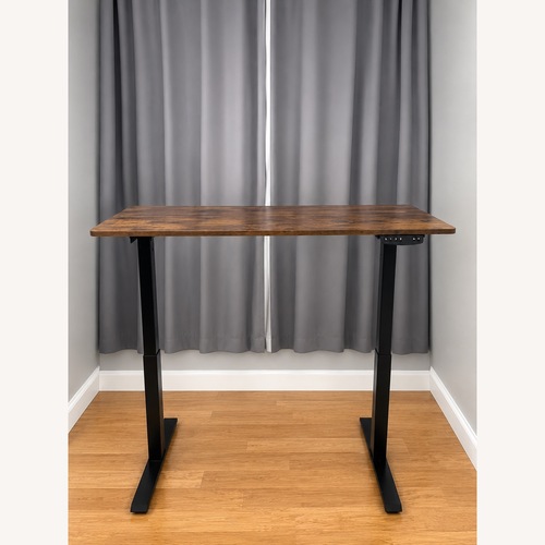 Used Electric Height Adjustable Standing Desk 40x24 for sale on AptDeco