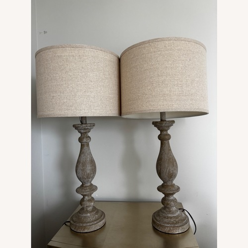 Used Signature Design Light Gray Resin Table Lamps for sale on AptDeco
