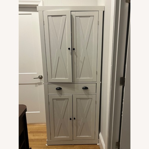 Used Tall Kitchen Pantry / Storage Cabinet  for sale on AptDeco