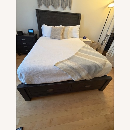 Used Jordan’s Furniture Queen Bed Frame With Storage for sale on AptDeco