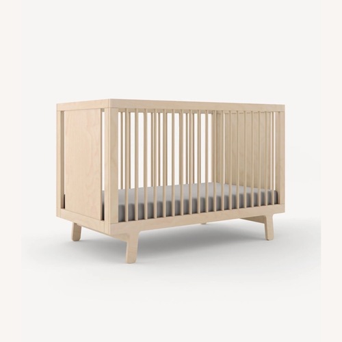 Used Oeuf Sparrow Natural Wood Crib for sale on AptDeco