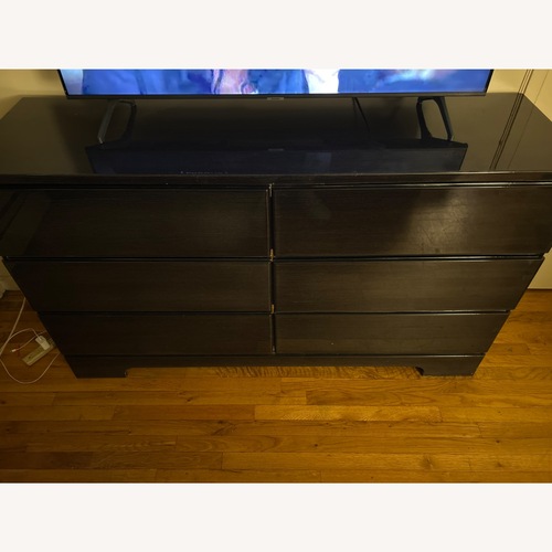 Used Rooms To Go Dark Brown Wood Dresser for sale on AptDeco