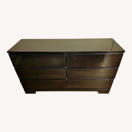 Used Rooms To Go Dark Brown Wood Dresser for sale on AptDeco