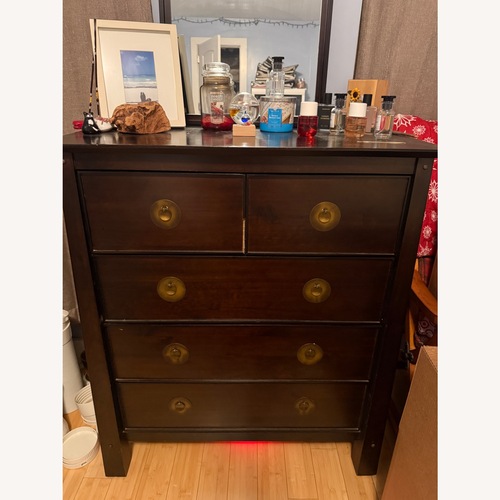 Used Pier 1 Imports Shanghai Dark Brown Wood Dresser for sale on AptDeco