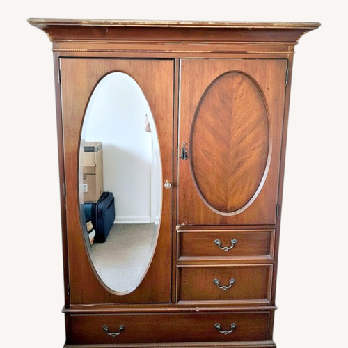 Used Vintage/Antique Finds Dark Brown Wood Armoire for sale on AptDeco