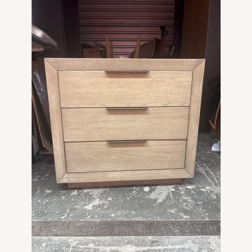 Used Living Spaces Pierce Light Brown Wood Dresser for sale on AptDeco