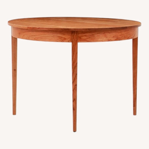 Used Dark Brown Wood Dining Table for sale on AptDeco