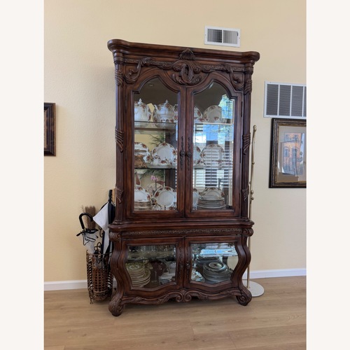 Used Michael Amini Furniture Designs Armoire for sale on AptDeco
