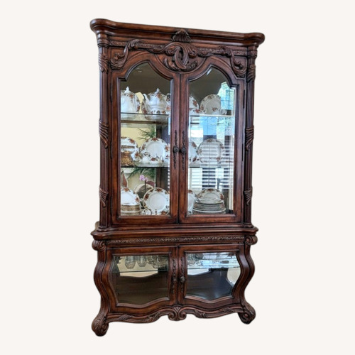 Used Michael Amini Furniture Designs Armoire for sale on AptDeco