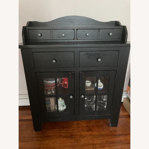 Used Pier 1 Imports Black Wood Cabinet for sale on AptDeco