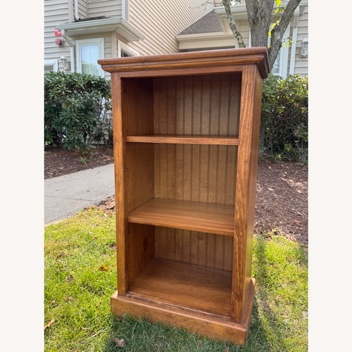 Used Gothic Cabinet Craft Natural Wood Bookcase for sale on AptDeco