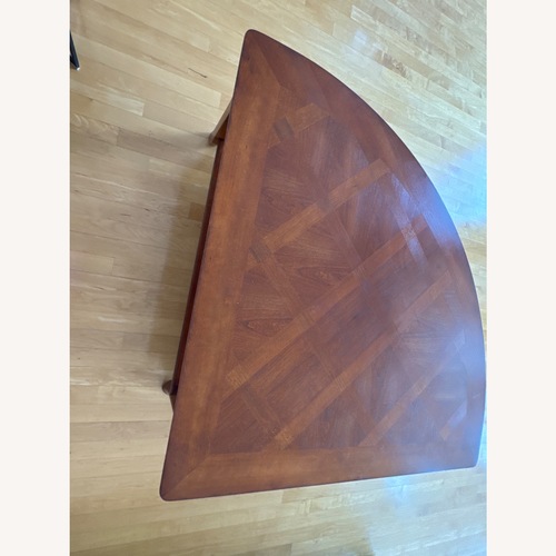 Used Raymour & Flanigan Dark Brown Wood Coffee Table for sale on AptDeco