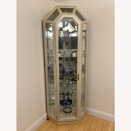 Used Lighted Corner Curio Cabinet for sale on AptDeco