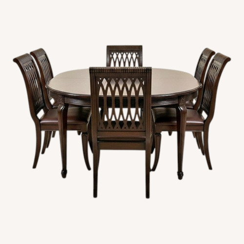 Used Dark Brown Wood Dining Set for sale on AptDeco