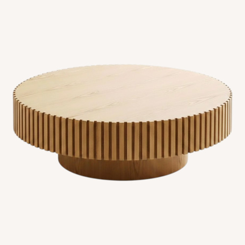 Used Amazon Round Pedestal Coffee Table with Ribbed Detailing for sale on AptDeco