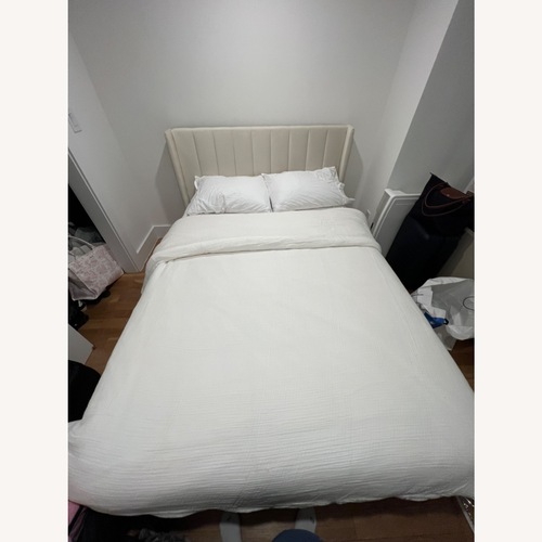 Used Eriksay Low Profile Upholstered Platform Bed with Wingback Headboard for sale on AptDeco