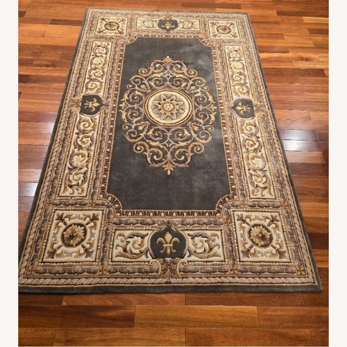 Used Vintage/Antique Green Wool Area Rug 5' x 8' for sale on AptDeco