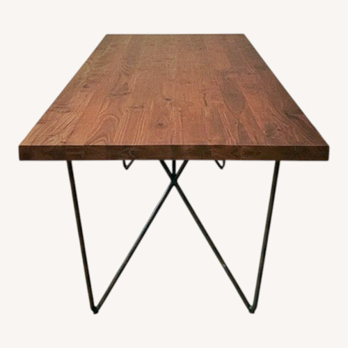 Used Solid Wood Acacia Dining Table for sale on AptDeco