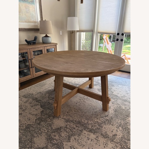 Used Pottery Barn Toscana Round Dining Table (54”-78”) for sale on AptDeco