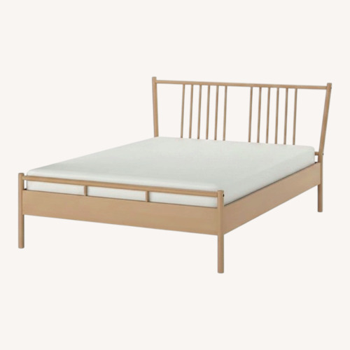 Used IKEA BJÖRKSNÄS Natural Wood King Bed for sale on AptDeco