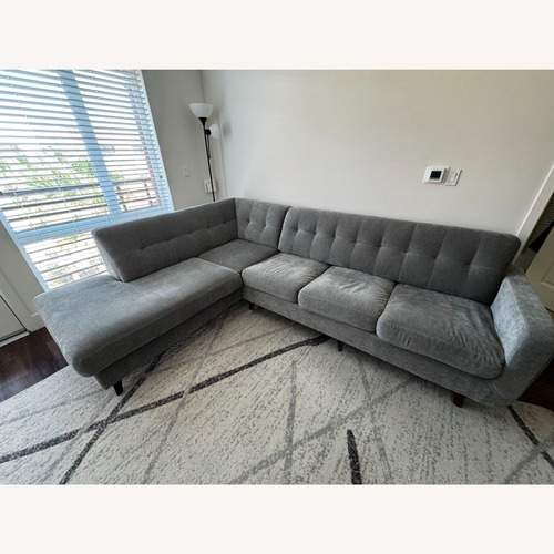 Used Living Spaces Allie Light Gray Fabric Sleeper Sofa for sale on AptDeco