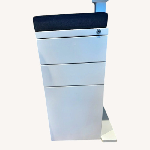 Used White 3 Drawers With Black Padding on Top for sale on AptDeco