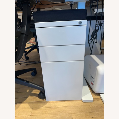 Used White 3 Drawers With Black Padding on Top for sale on AptDeco