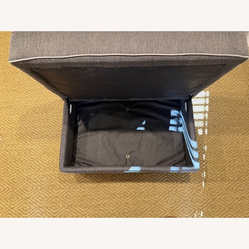 Used  Dark Gray Storage Ottoman for sale on AptDeco