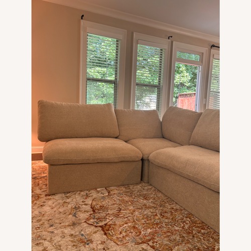 Used Kenda 6-Piece Upholstered Modern Linen Slipcovered Sectional Sofa With Ottoman for sale on AptDeco