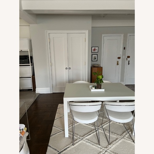 Used Calligaris White Key Extension Dining Table. for sale on AptDeco