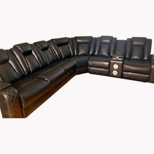 Used Black Leather Sectional  for sale on AptDeco