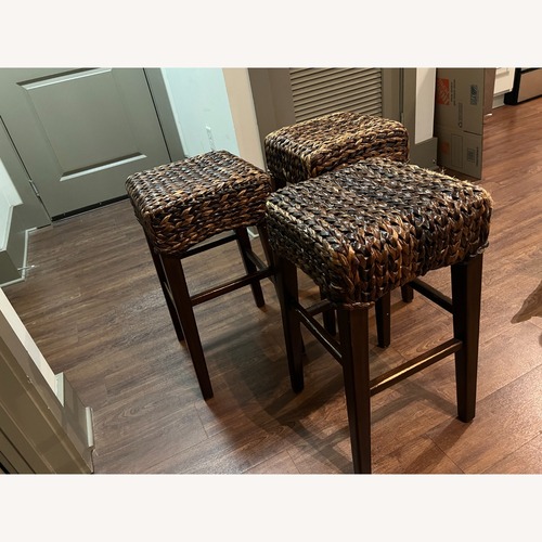 Used Pottery Barn Seagrass Backless Counter Height Stools for sale on AptDeco