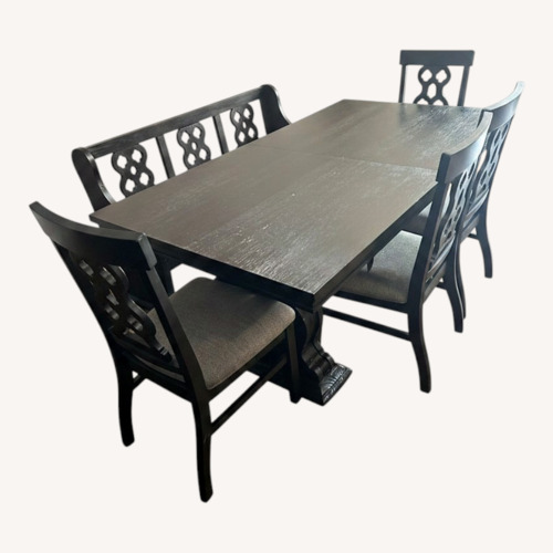 Used Dark Gray Wood Dining Set for sale on AptDeco