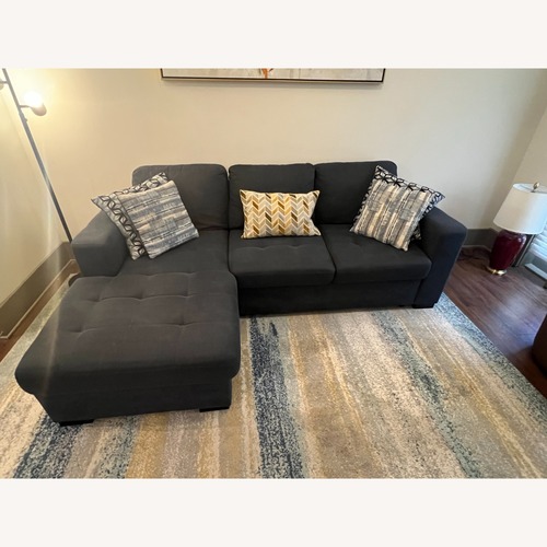 Used Blue 2 Piece Sectional w Pillows for sale on AptDeco