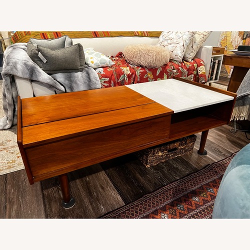 Used West Elm Mid-Century Marble Pop-Up Coffee Table 48" for sale on AptDeco