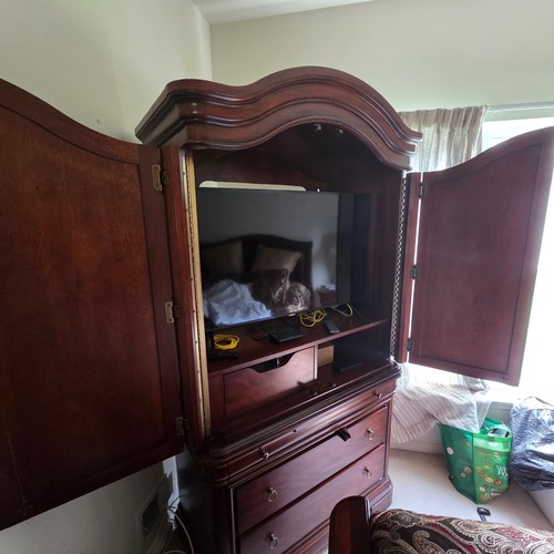 Used Dark Brown Wood Armoires for sale on AptDeco