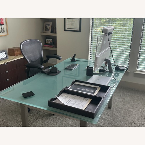 Used Desk Thick Glass Top & Brushed Metal Base for sale on AptDeco