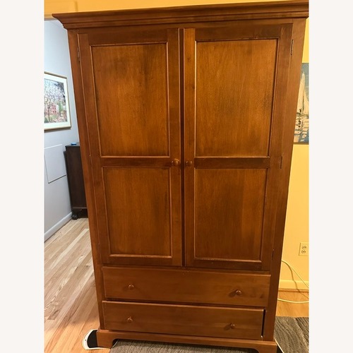 Used Nadeau Furniture Brown Wardrobe/Armoire for sale on AptDeco
