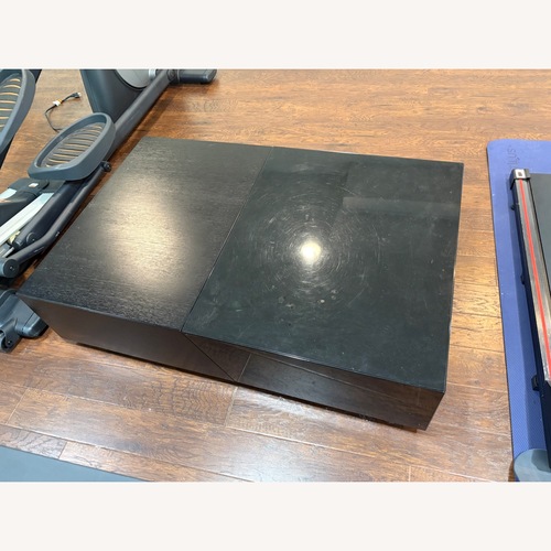 Used Sherwood Studios Sliding Black Coffee Table for sale on AptDeco